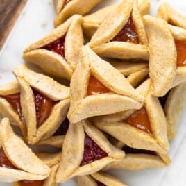 Paleo hamantaschen with apricot and raspberry jam.