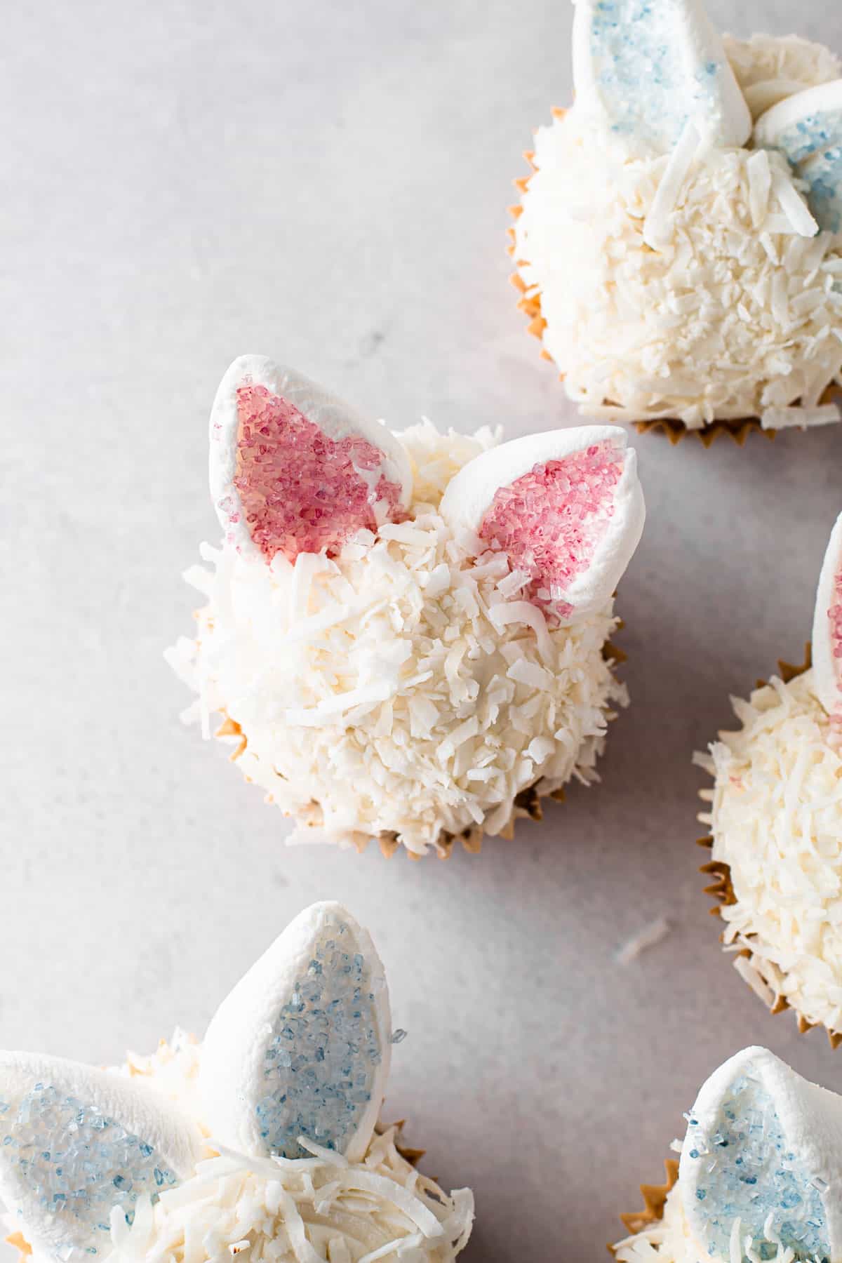 Bunny cupcakes with pink ears and coconut fur.