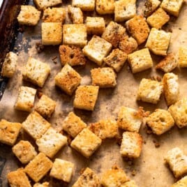 Baked croutons on a baking sheet.