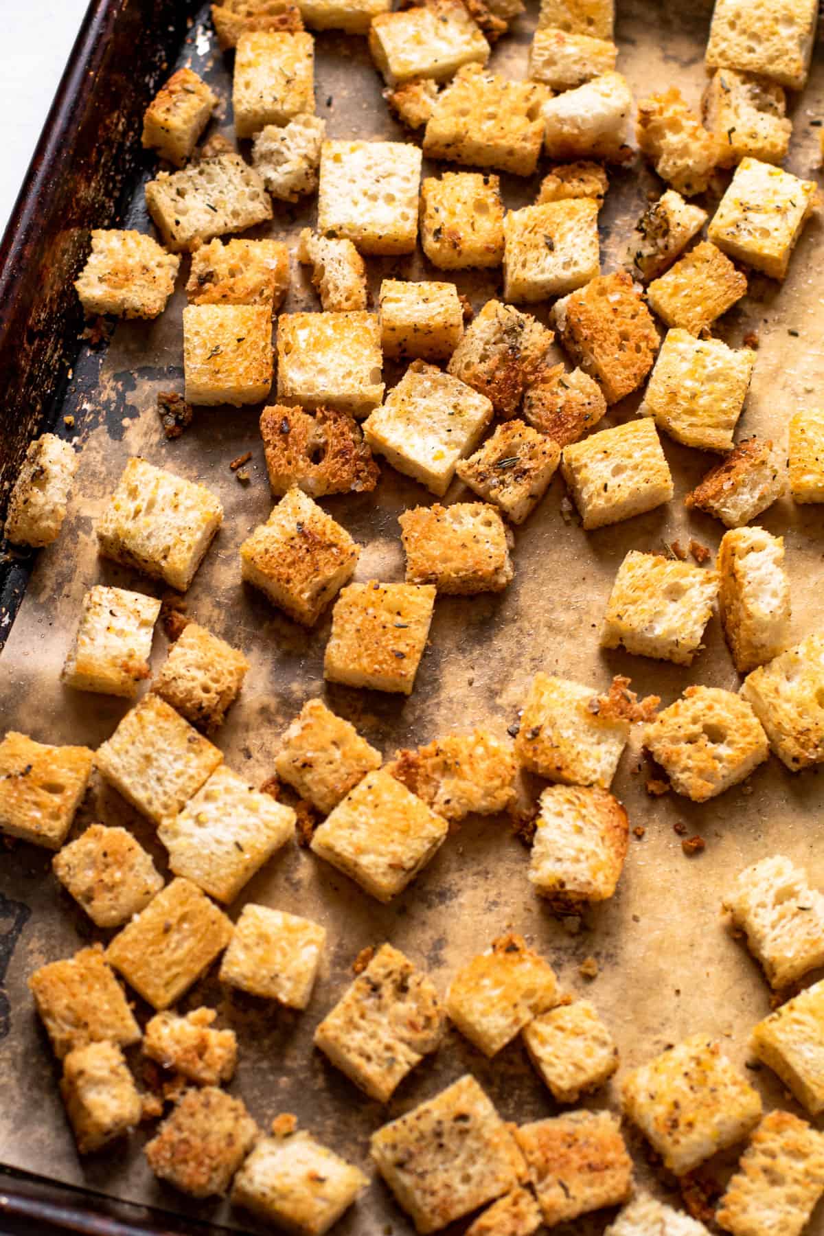 Baked croutons on a baking sheet.