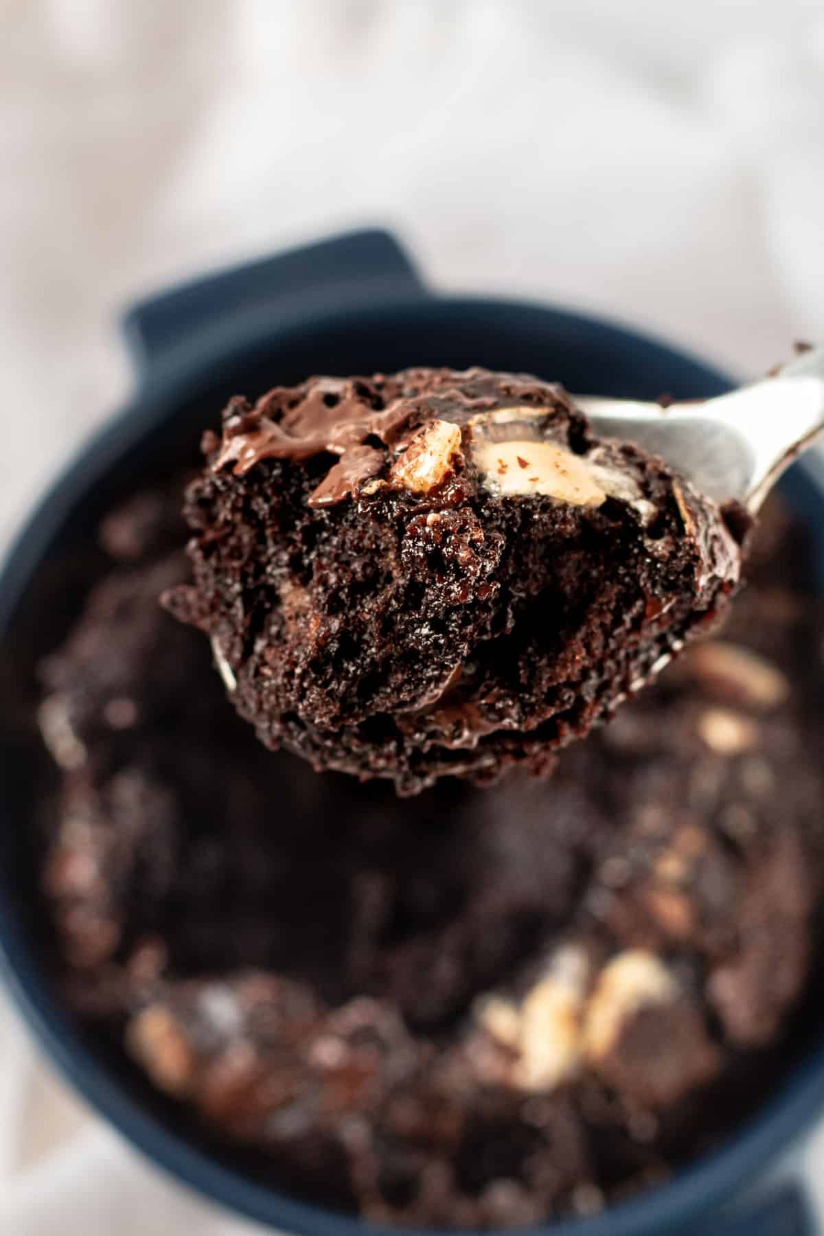 A spoonful of chocolate baked oats.