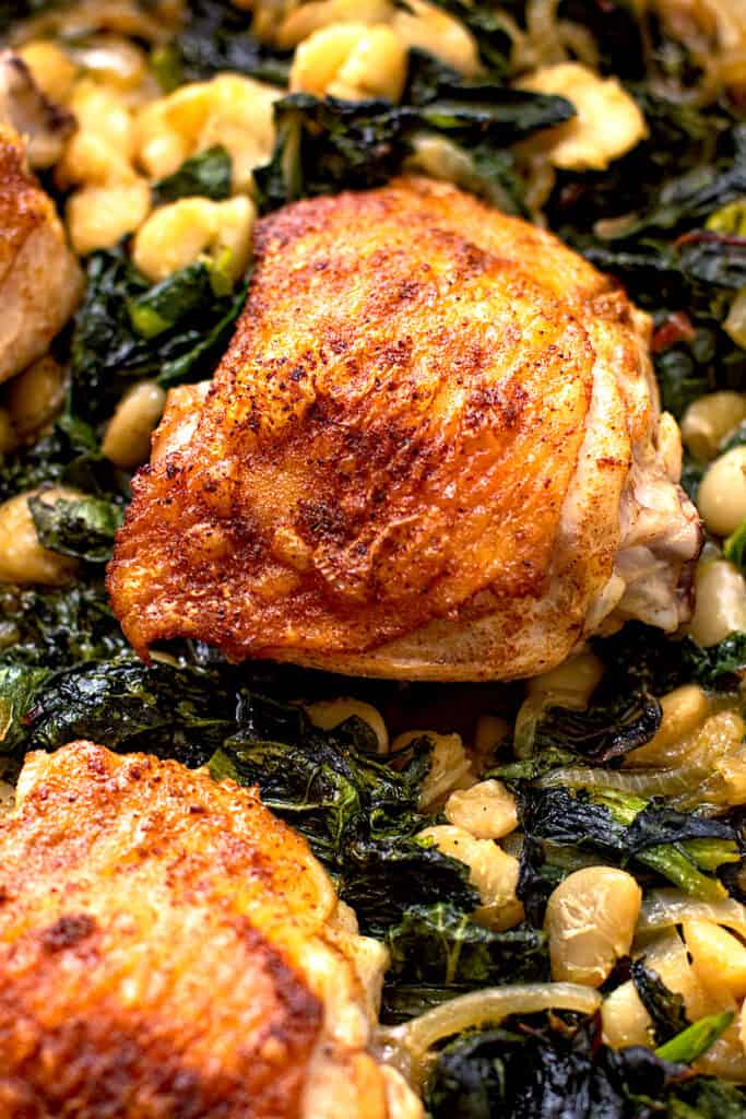 Chicken thighs with spring greens.