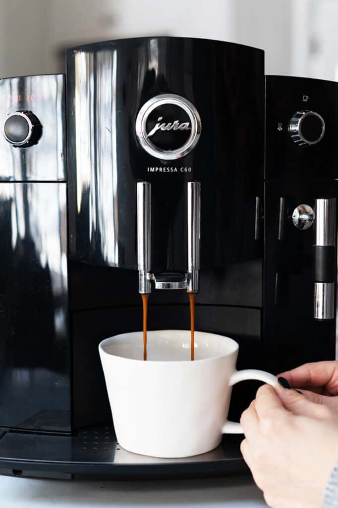 An impressive coffee machine brewing coffee.