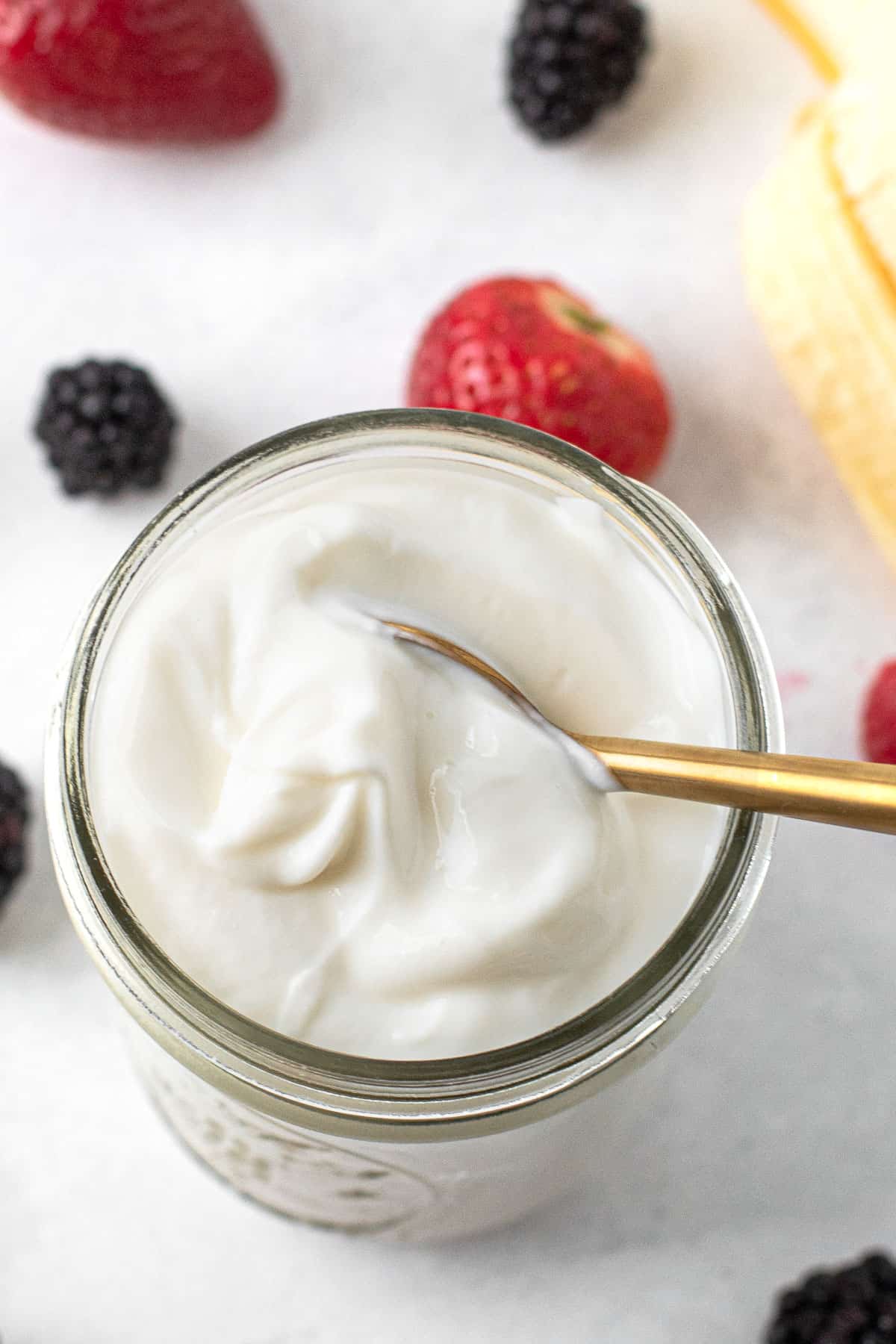 Greek yogurt in a jar with fruit,