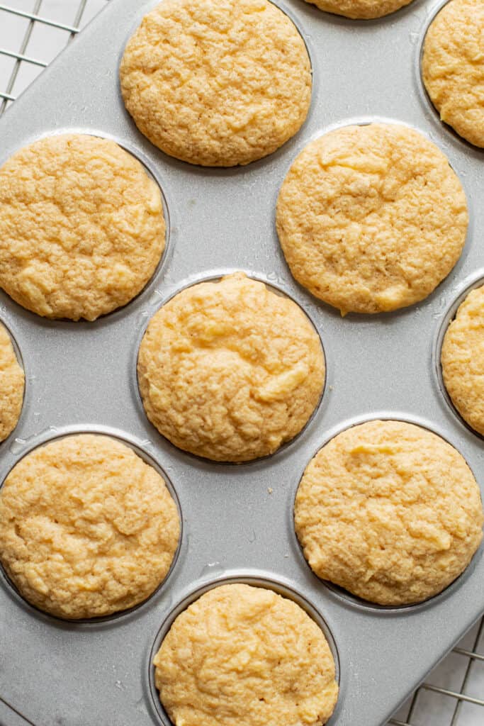 Mini oat muffins in a muffin tin.