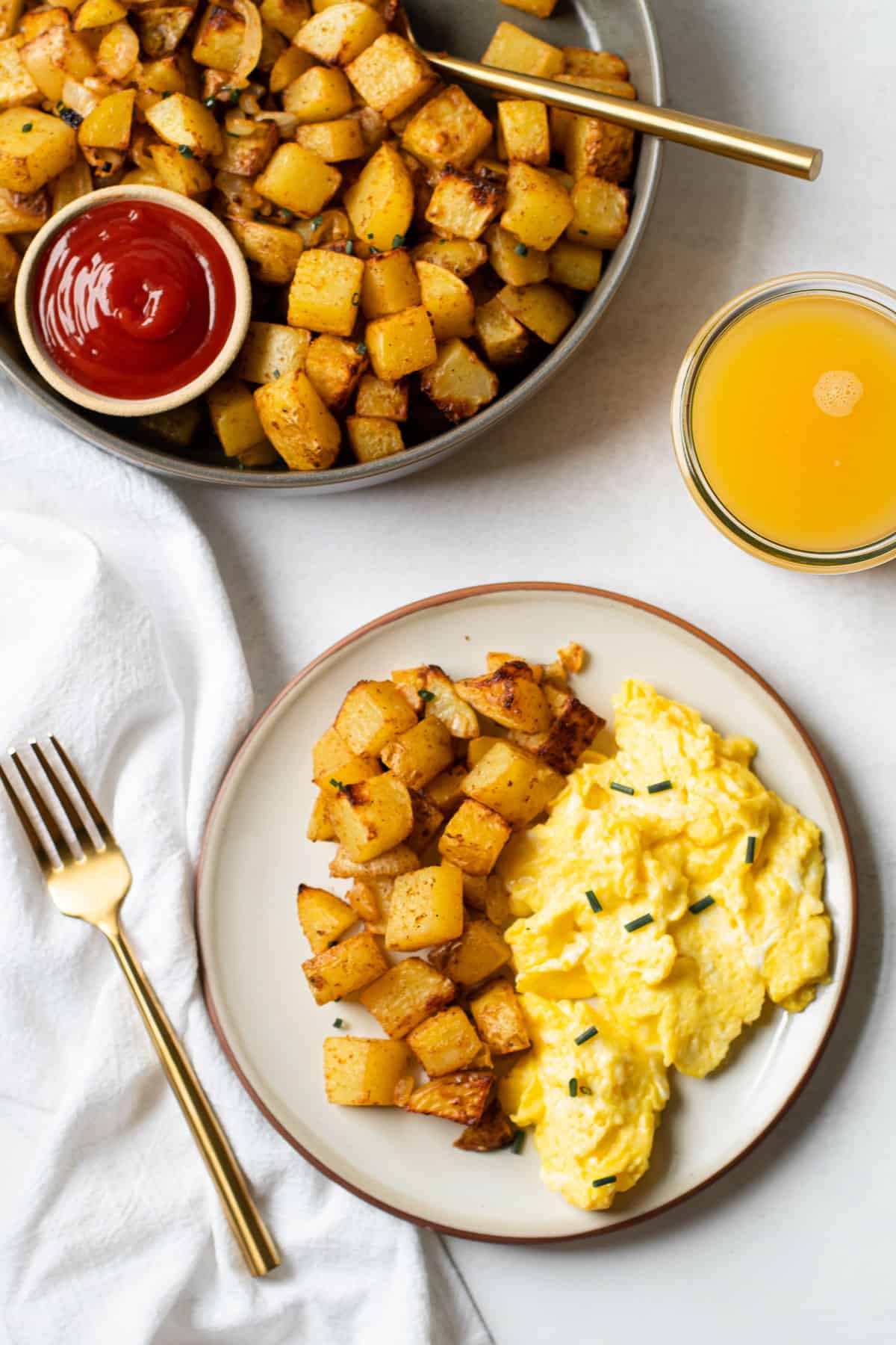Breakfast plates with air fried potatoes.