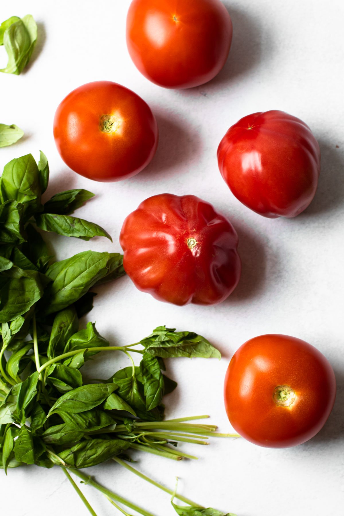 Fresh tomatoes and basil for fresh tomato pasta.