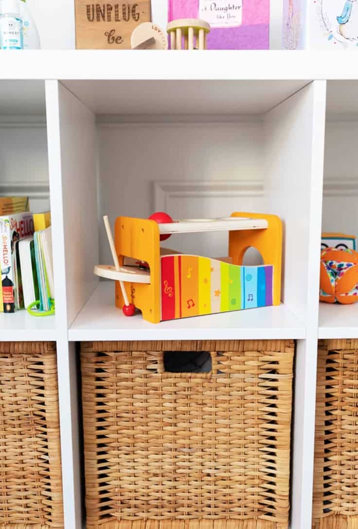 A shelf with non toxic baby toys.