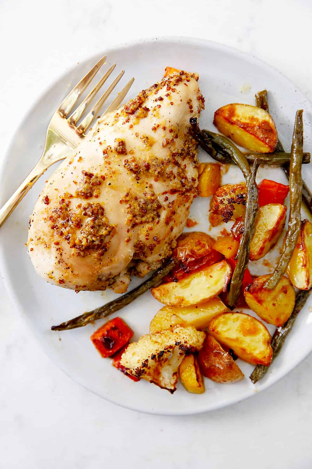 honey mustard chicken on a plate with vegetables