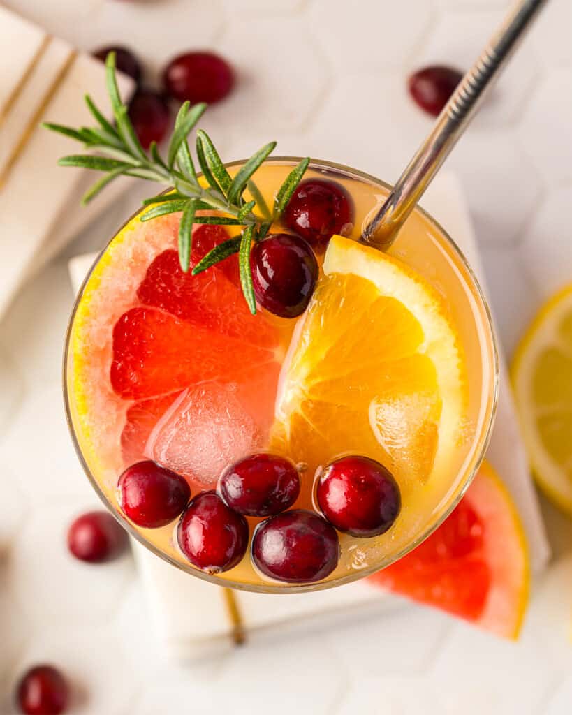 overhead photo of holiday punch with fresh fruit