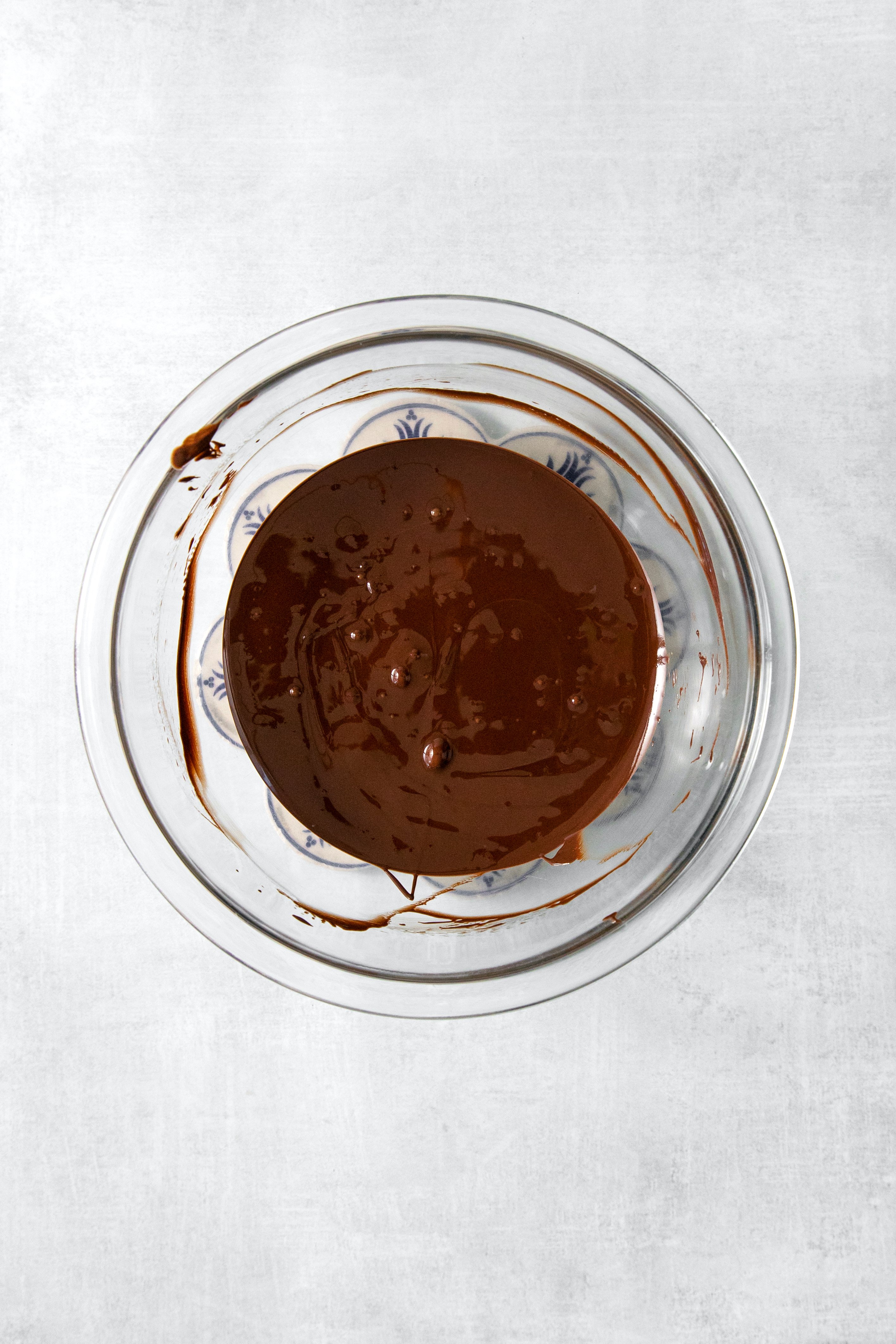 overhead of a bowl of melted chocolate.