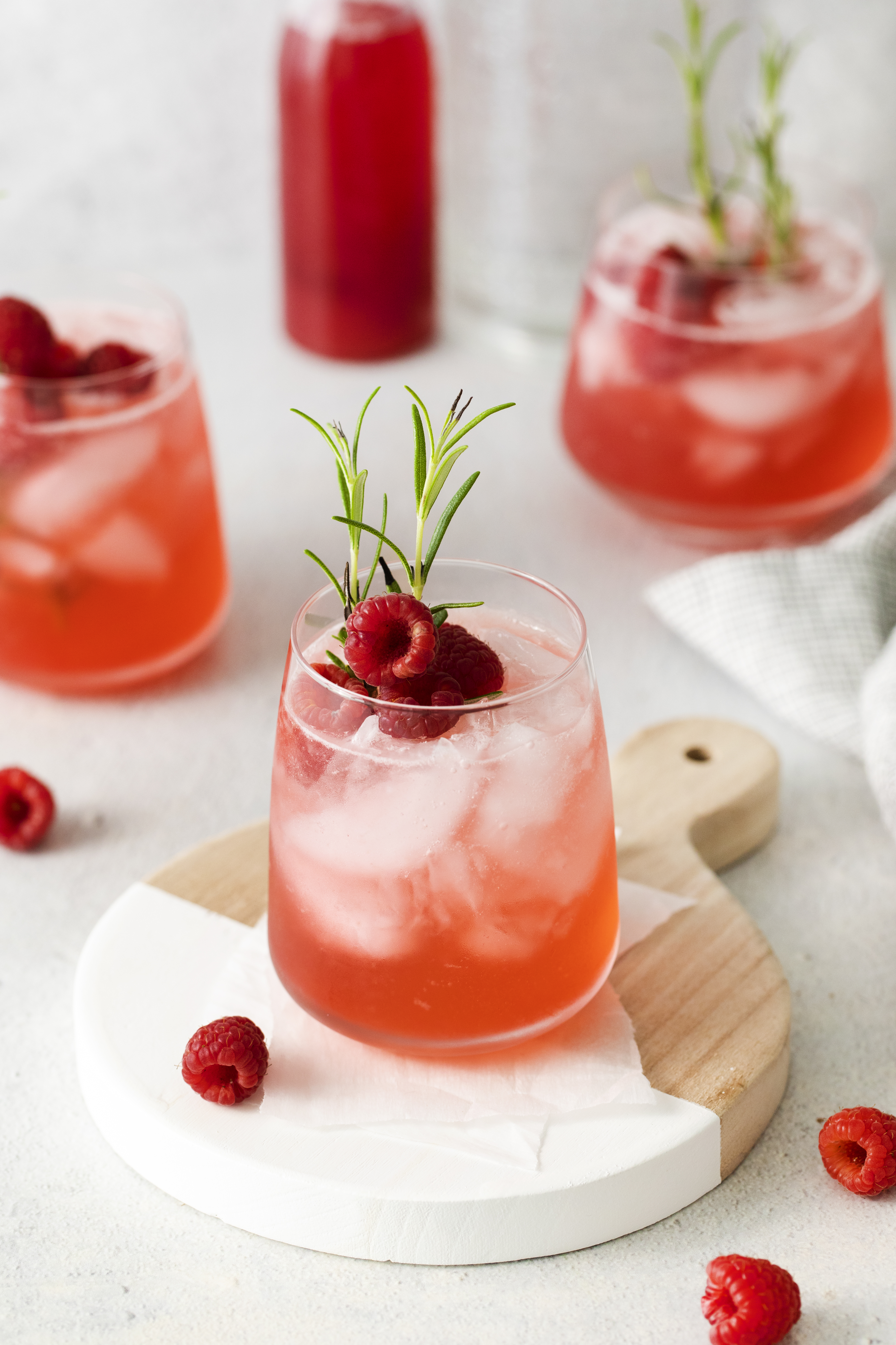 This Raspberry Gin Cocktail is the perfect sweet and fruity drink for Valentine’s day. This refreshing cocktail is made with two types of liquor, fresh lemon, and a refined sugar-free raspberry simple syrup!