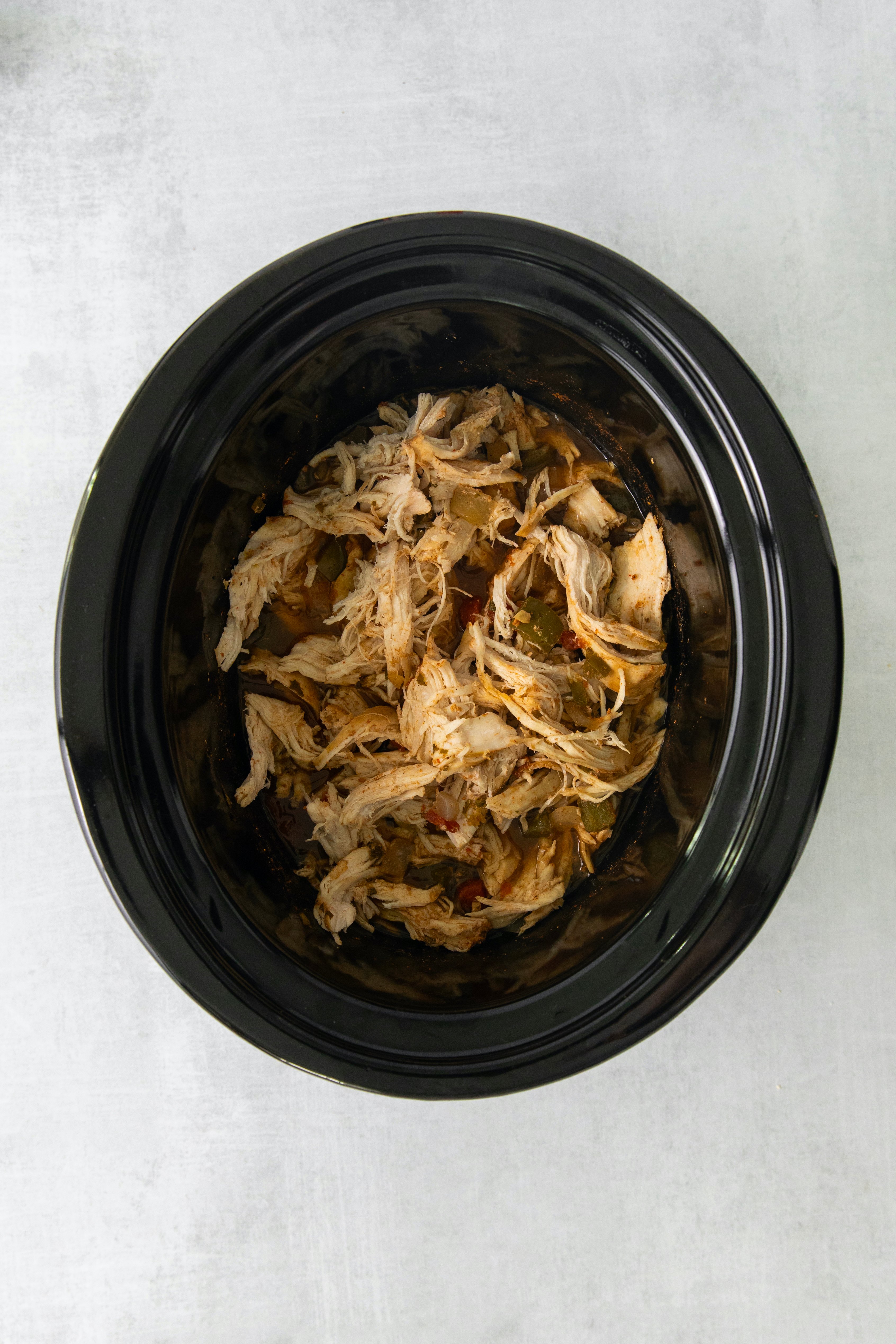 shredded chicken in a crockpot.