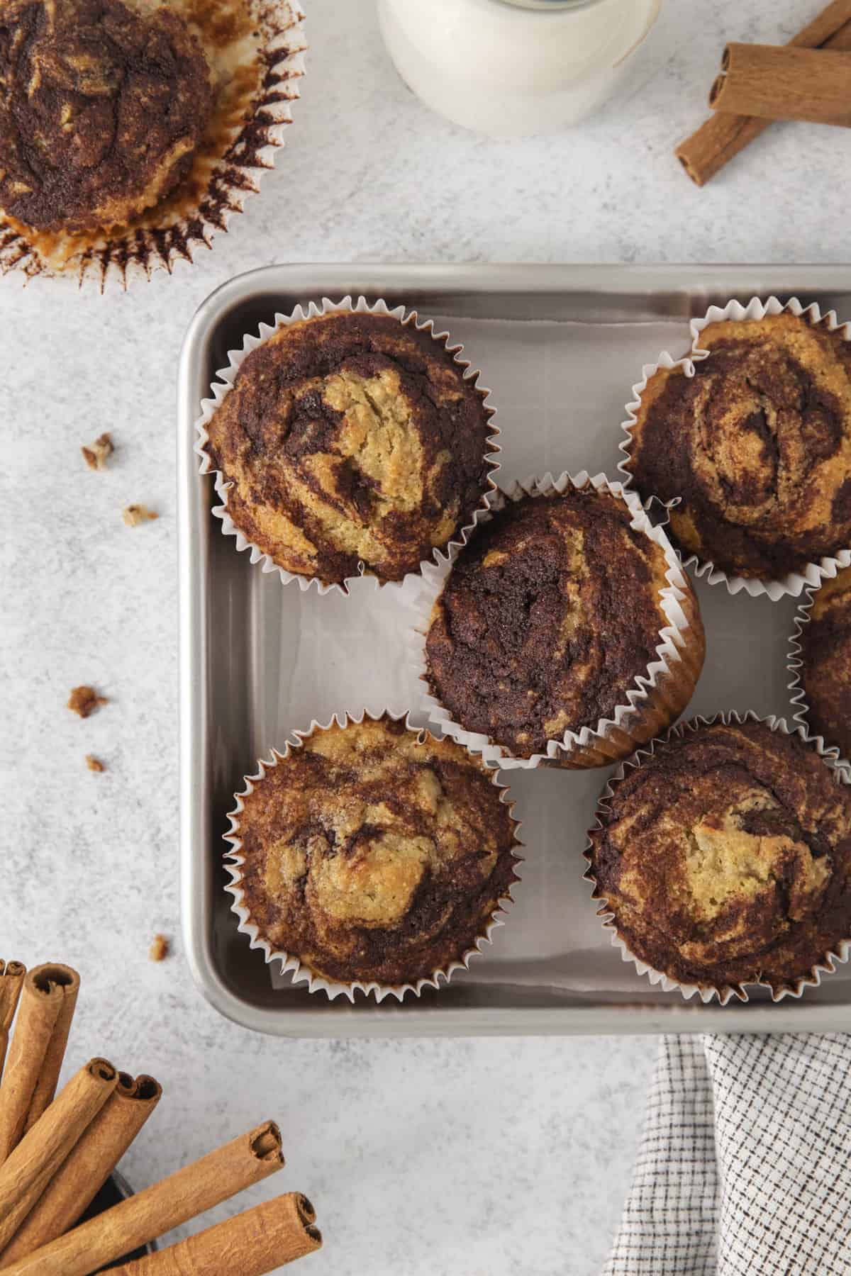 muffins on a silver tray.