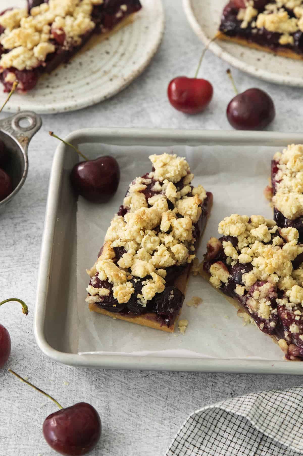 a tray with cherry pie bars.