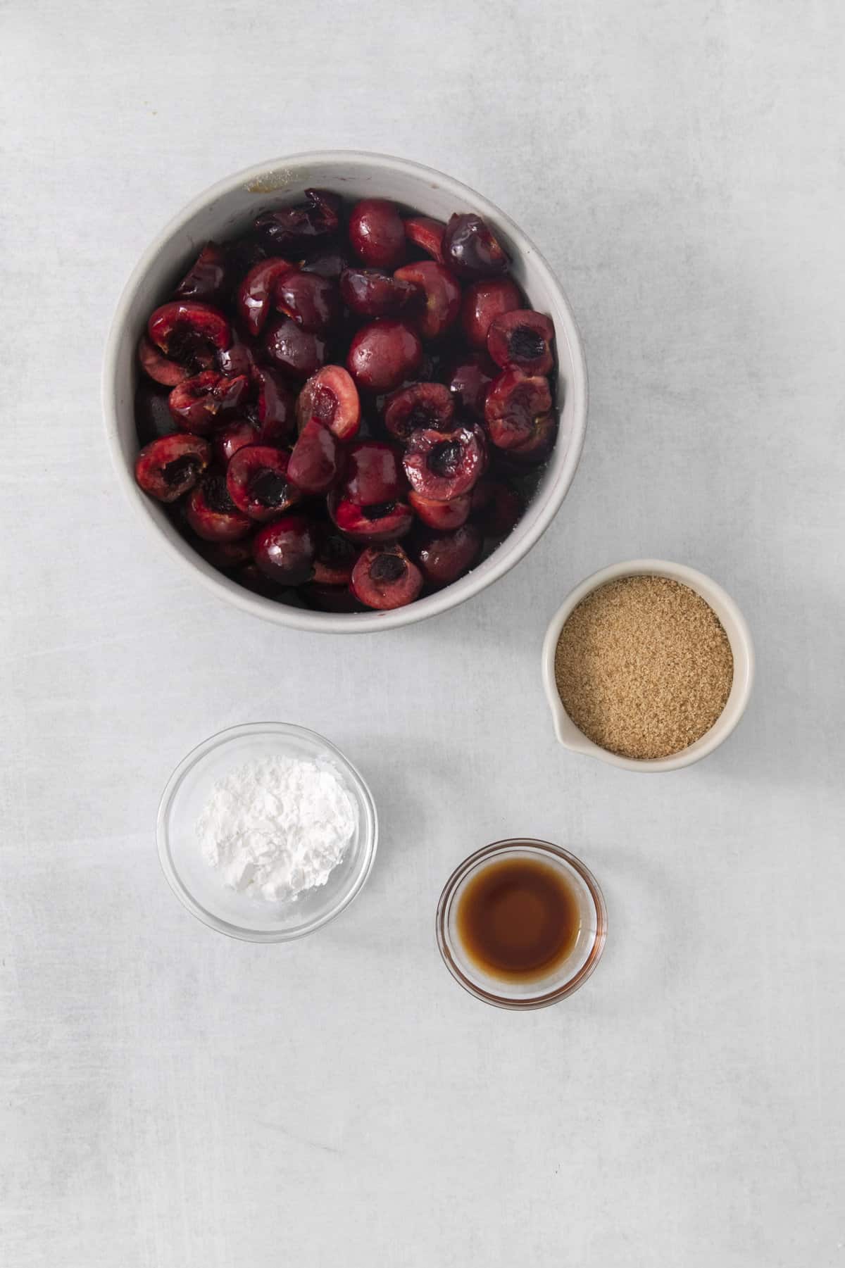 cherry pie filling ingredients in bowls.