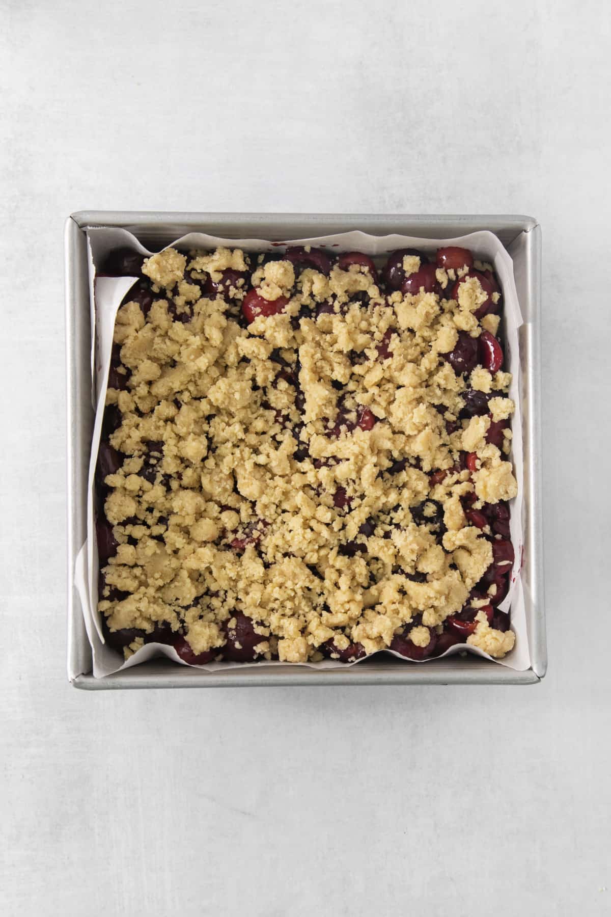 assembled cherry pie bars in a dish.