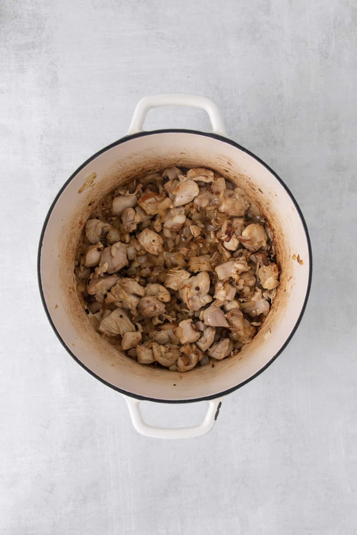 cooked chicken in a large pot.