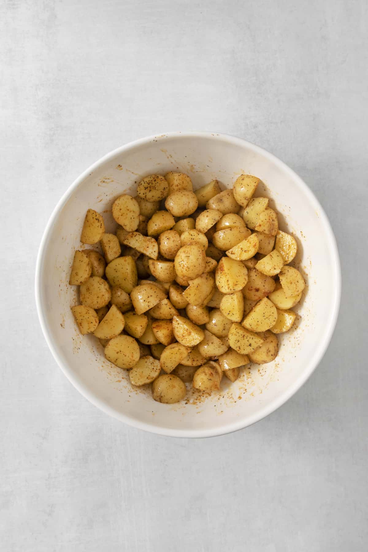 potato chunks in a mixing bowl.