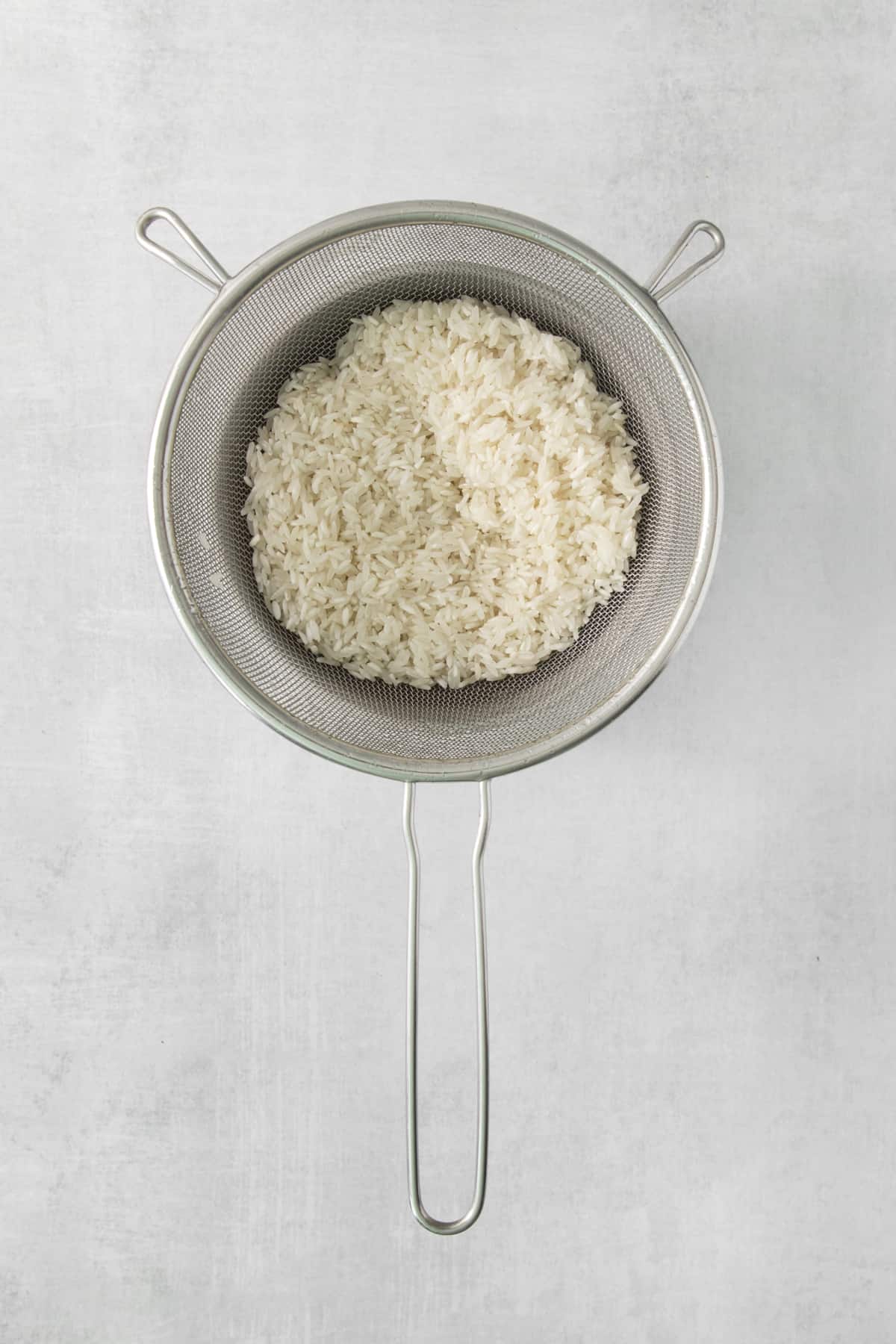 rice in a strainer.