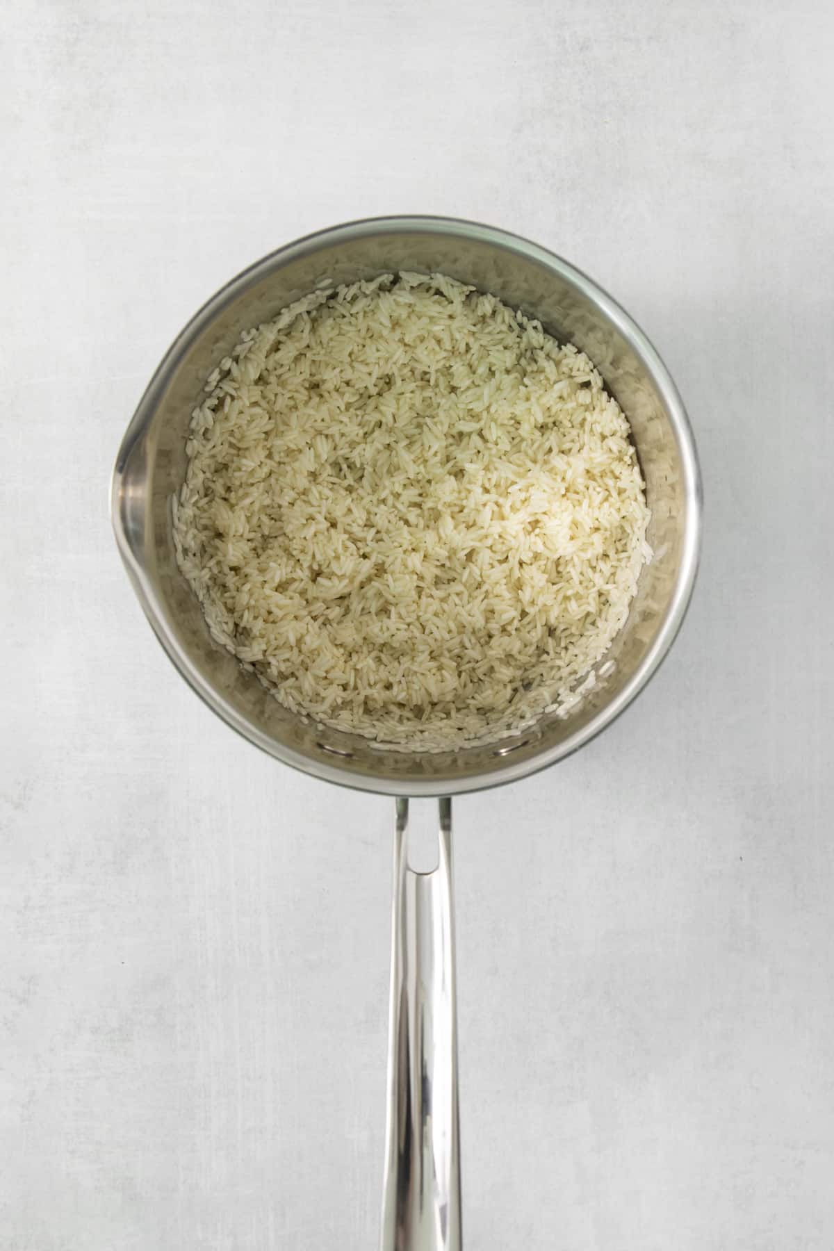 cooked rice in a pan.