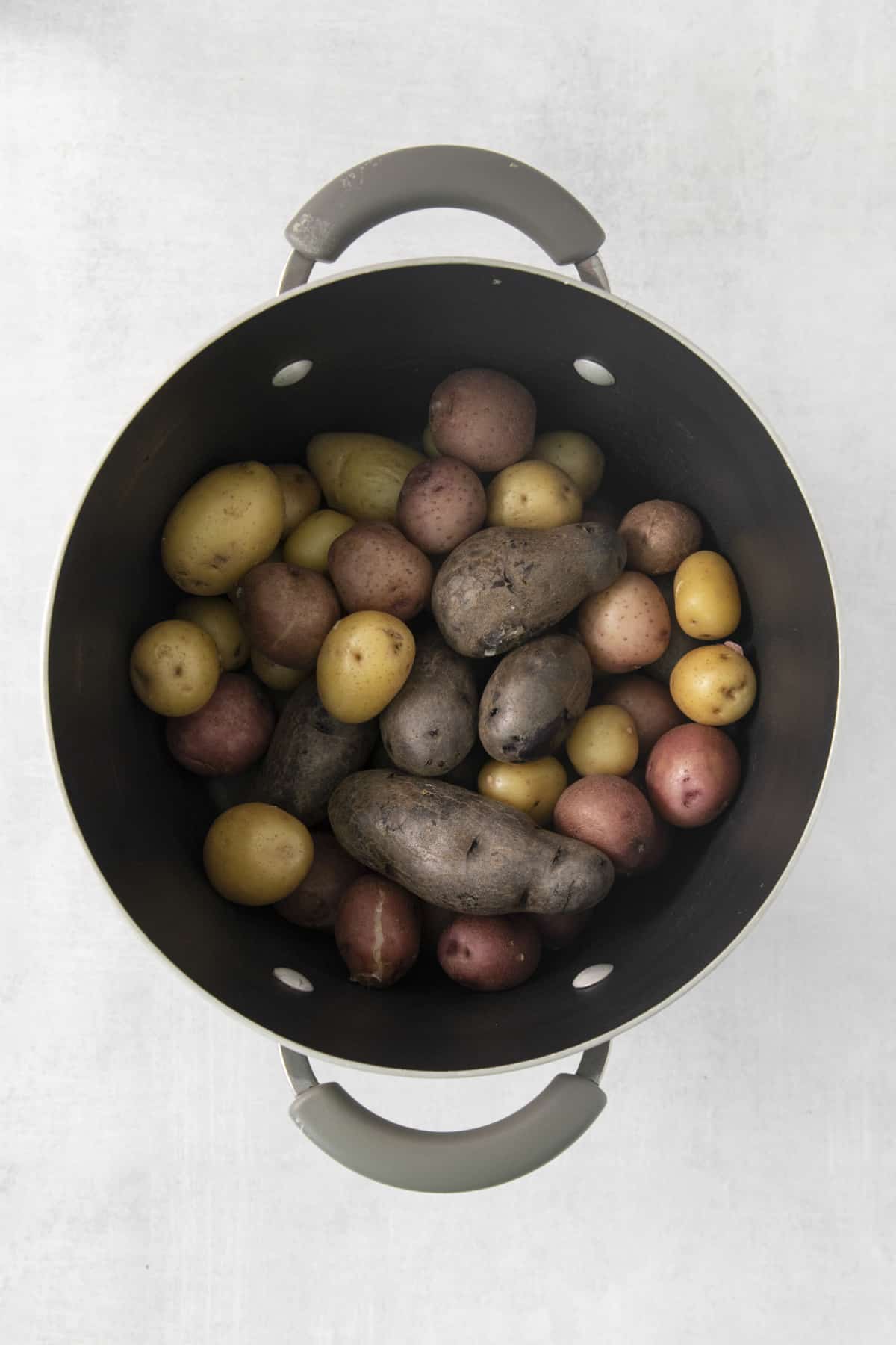 cooked potatoes in a pot.