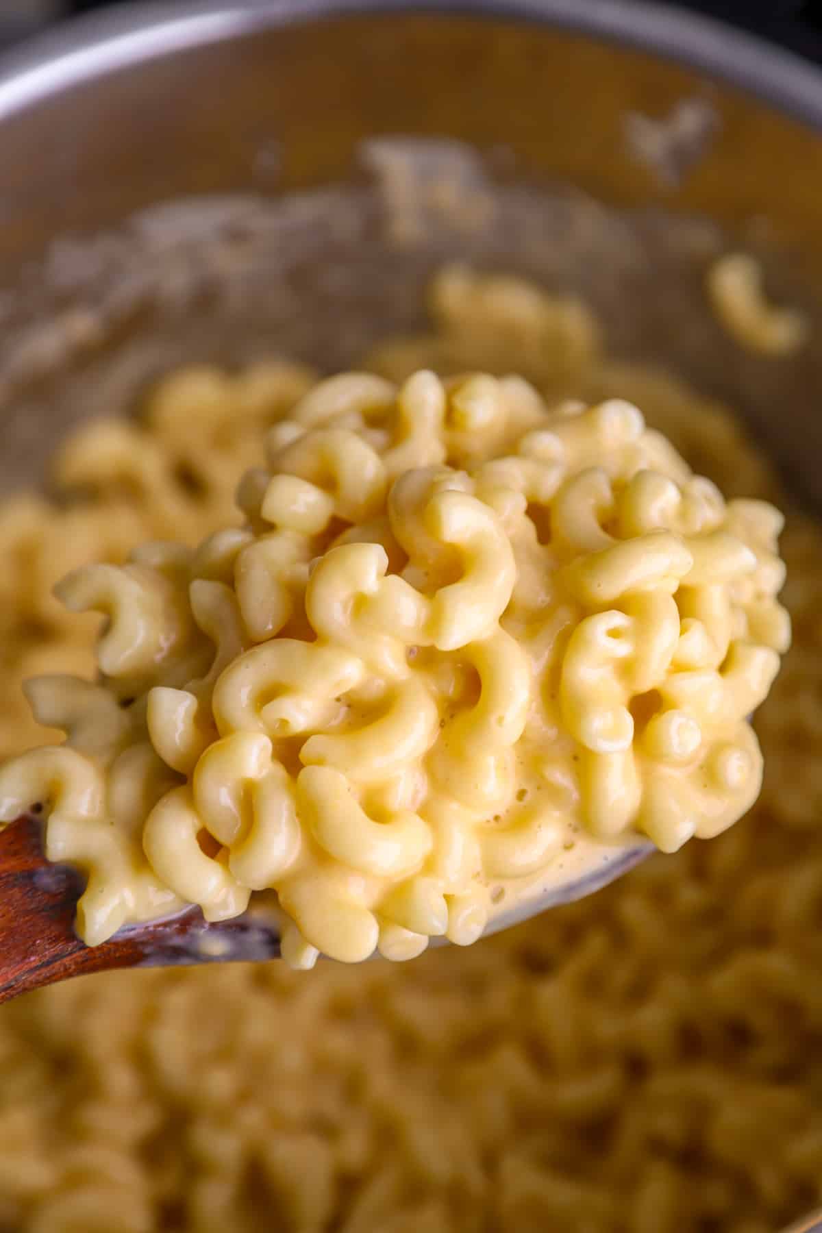 A spoonful of Instant Pot Mac and Cheese ready to serve