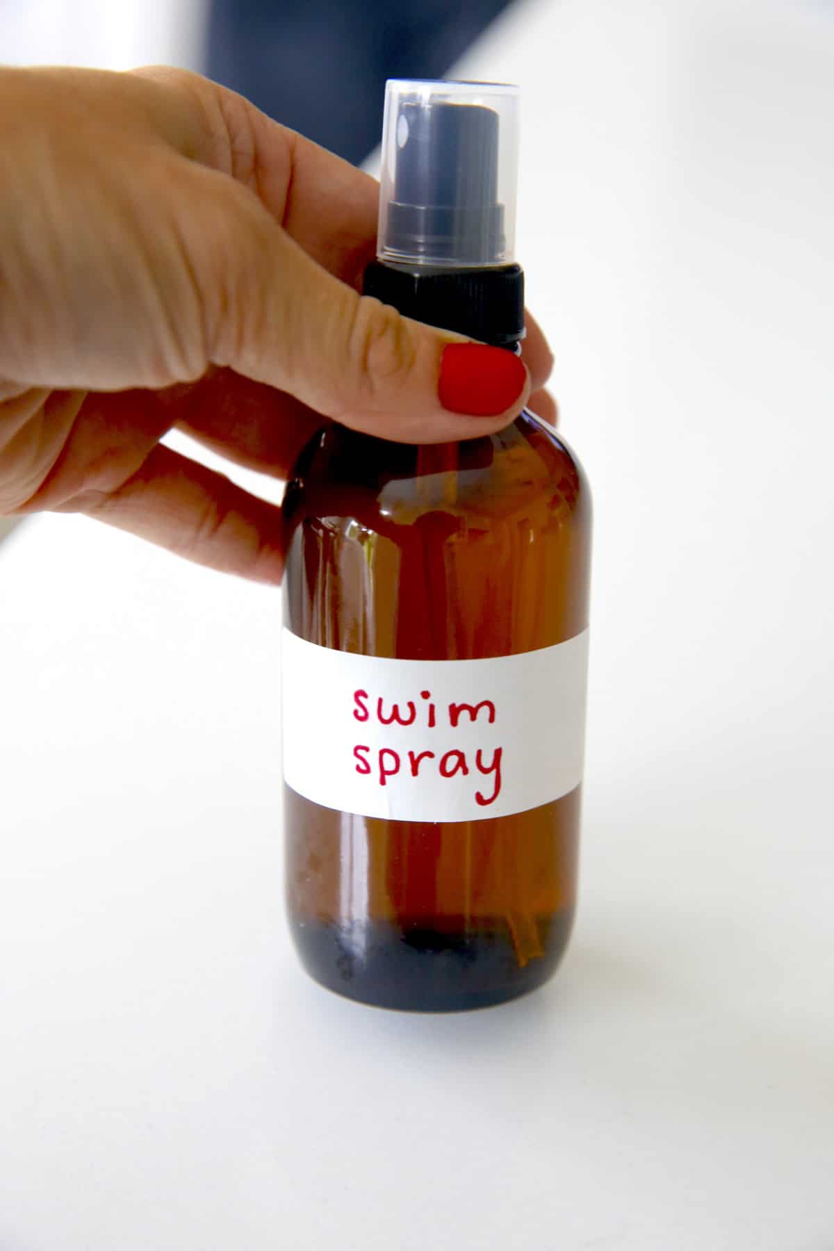 A bottle of swim spray for chlorine exposure