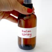 A bottle of swim spray for chlorine exposure