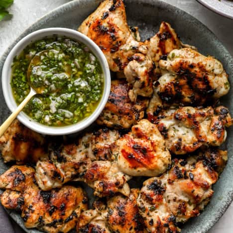 A plate of grilled chimichurri chicken.