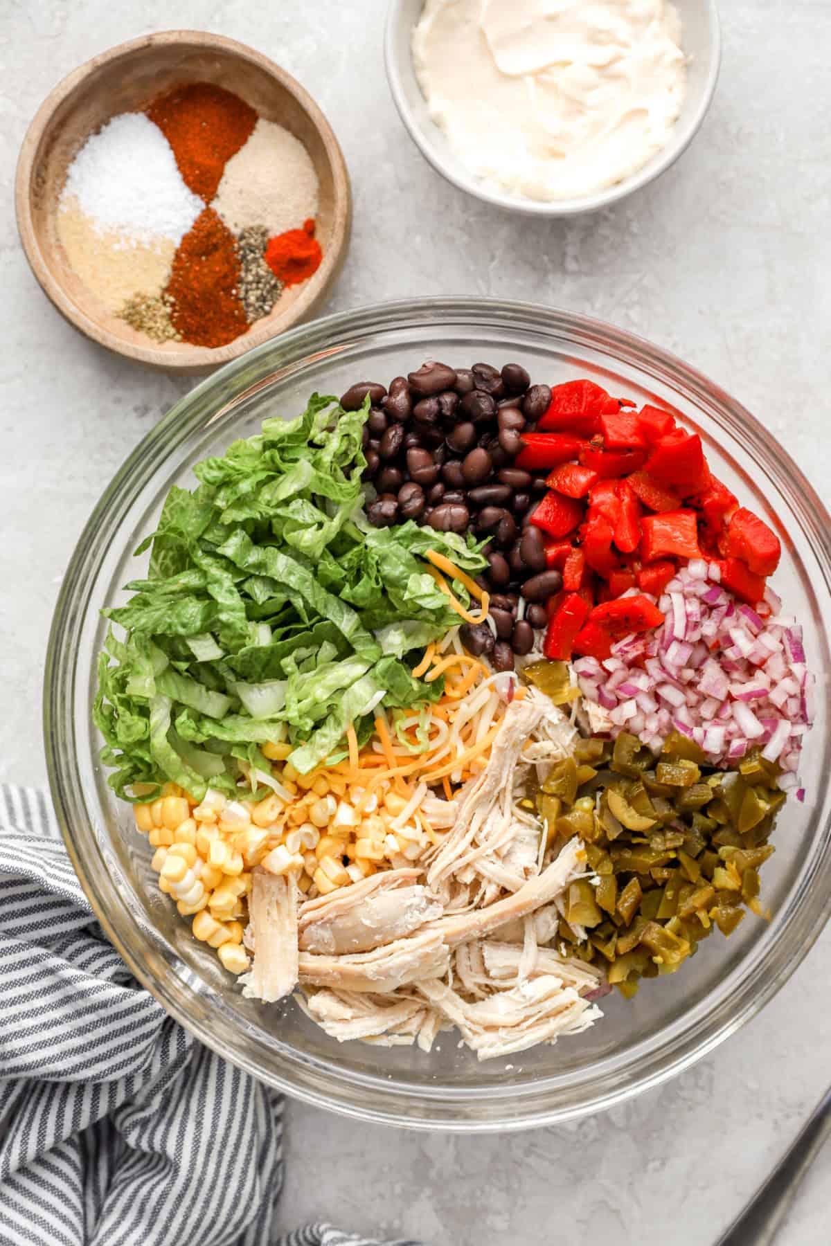 Chicken taco salad ingredients in a bowl. 