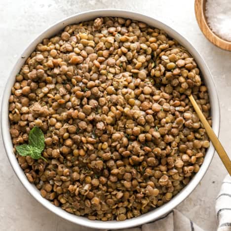 Overhead image of a bowl of cooked lentils.