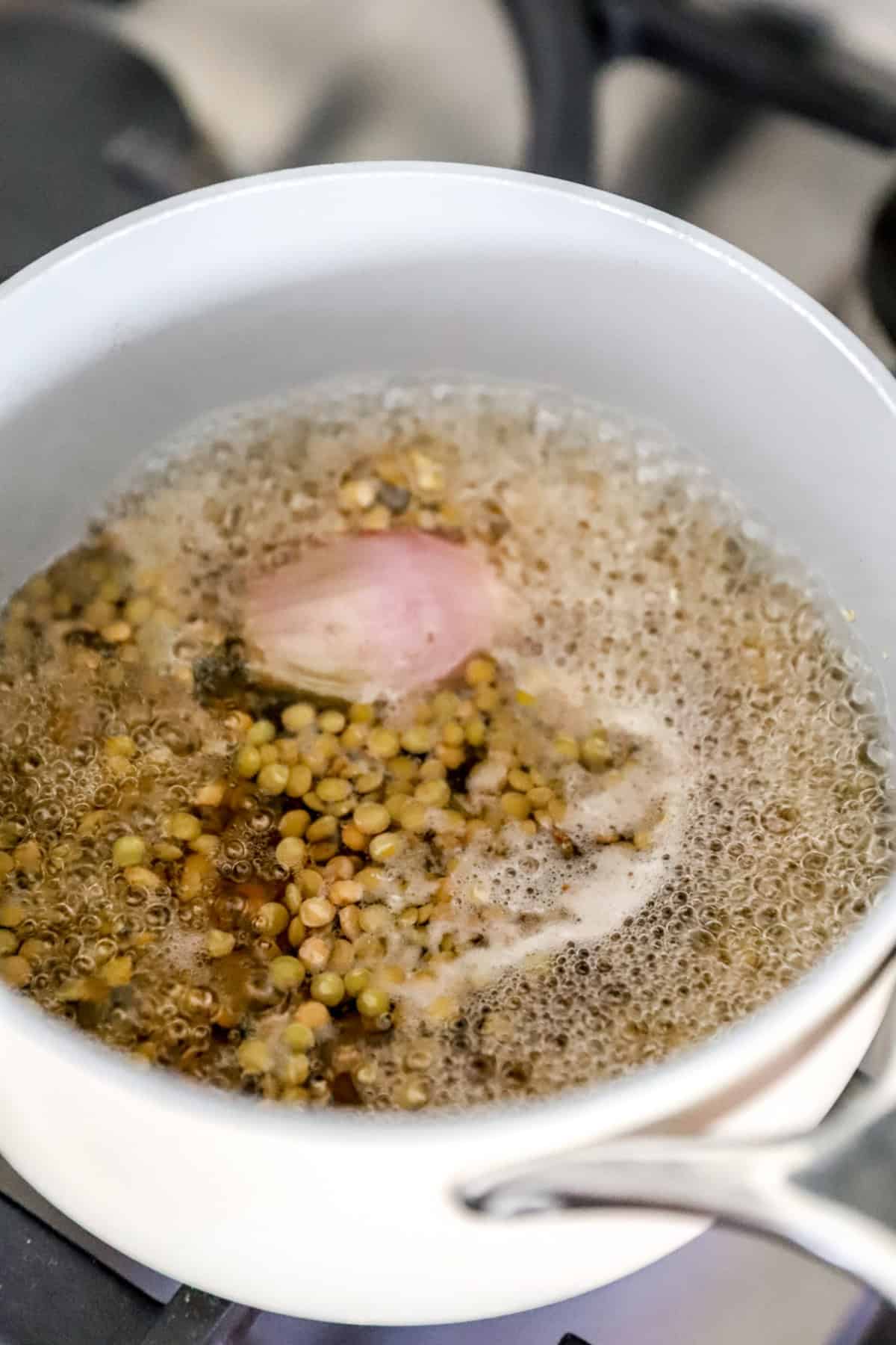 A pot of cooked lentils. 