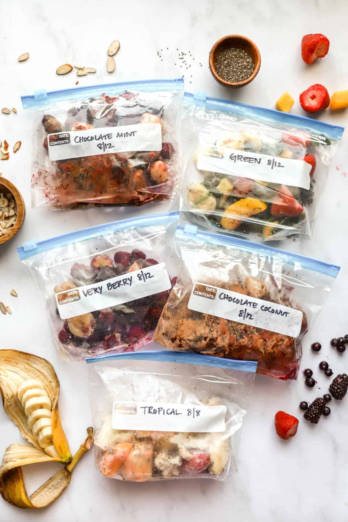 Five different freezer smoothie packs. 