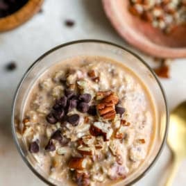 Overhead image of a jar of pumpkin spice overnight oats.