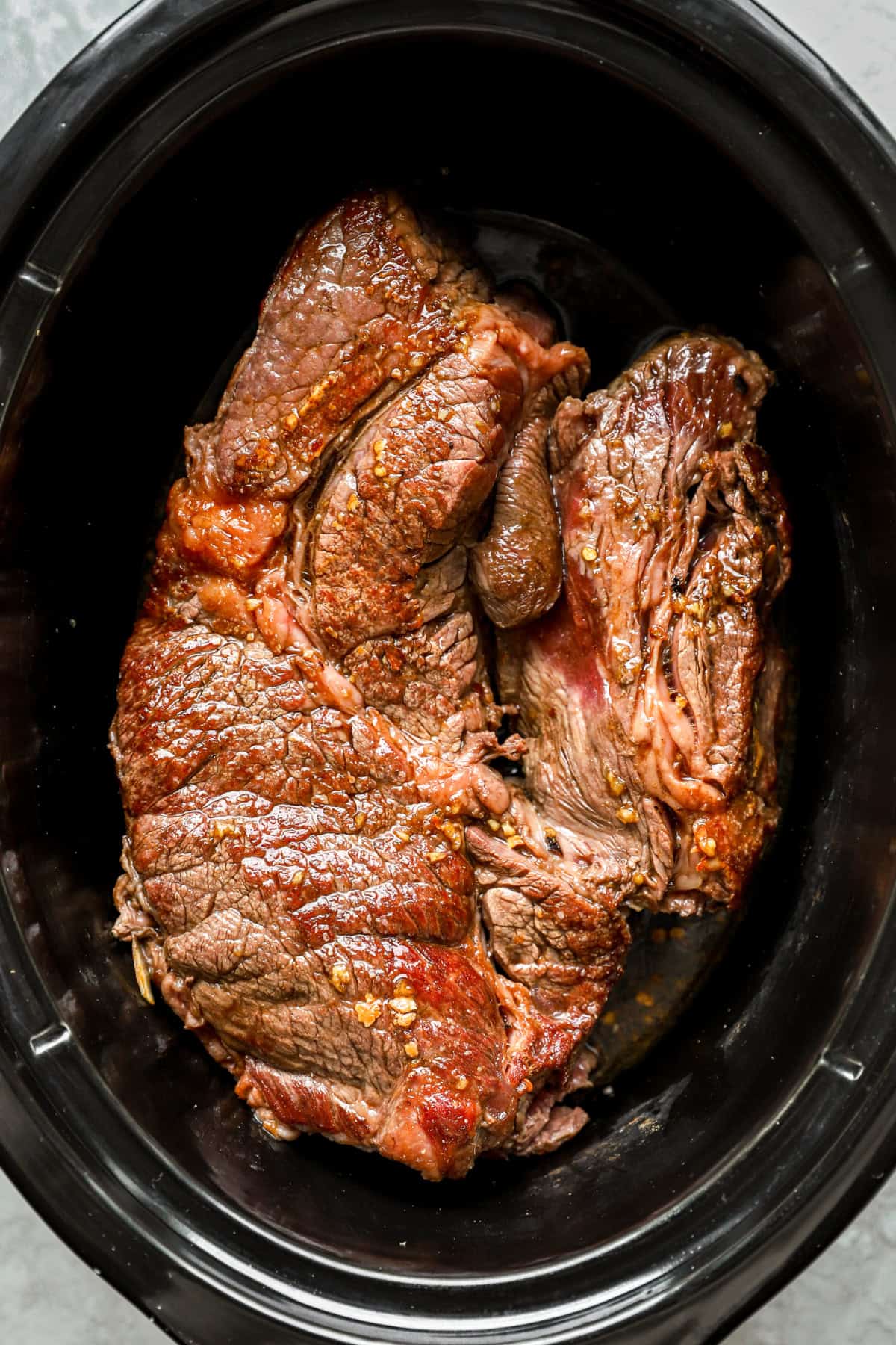 Beef in a slow cooker. 