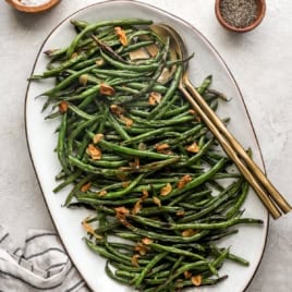 A platter of garlicky blistered green beans.