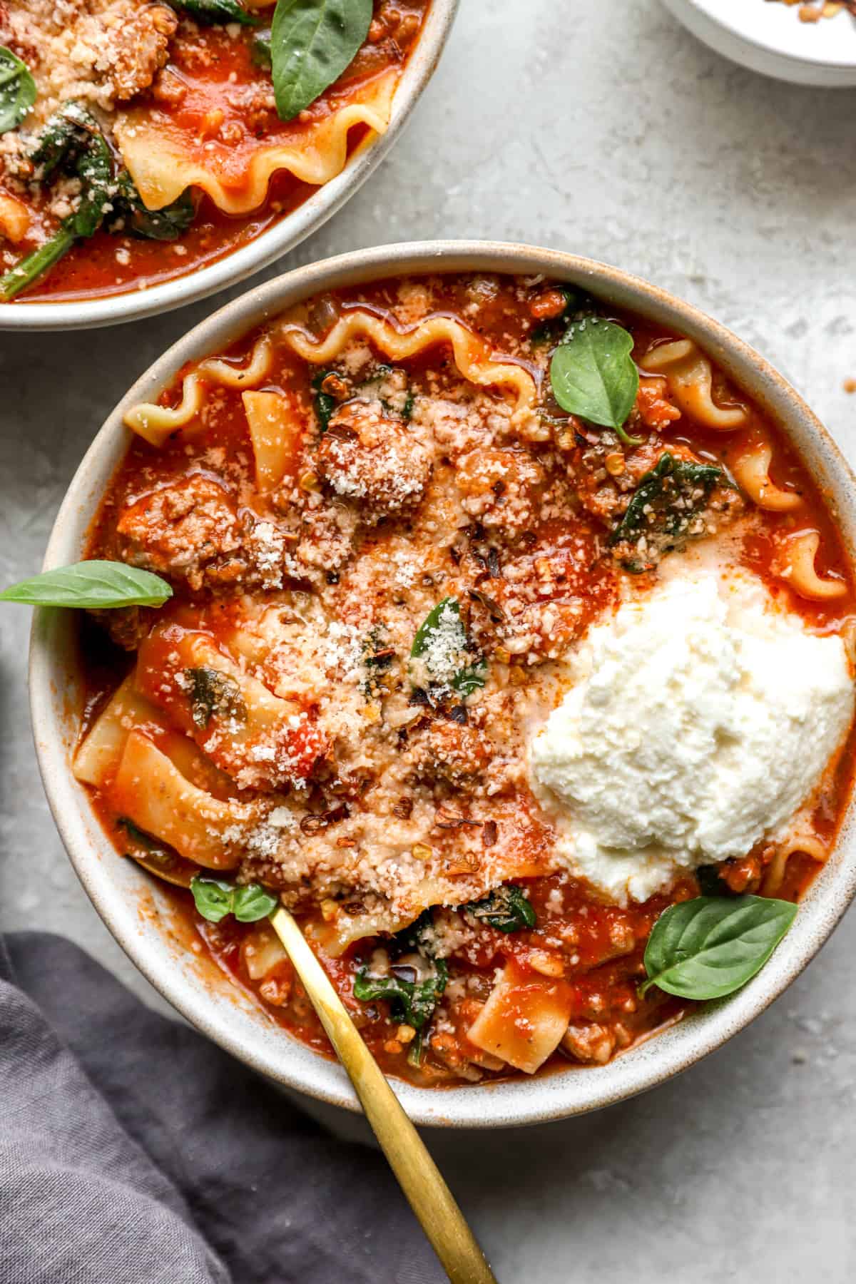 Overhead image of a bowl of lasagna soup. 