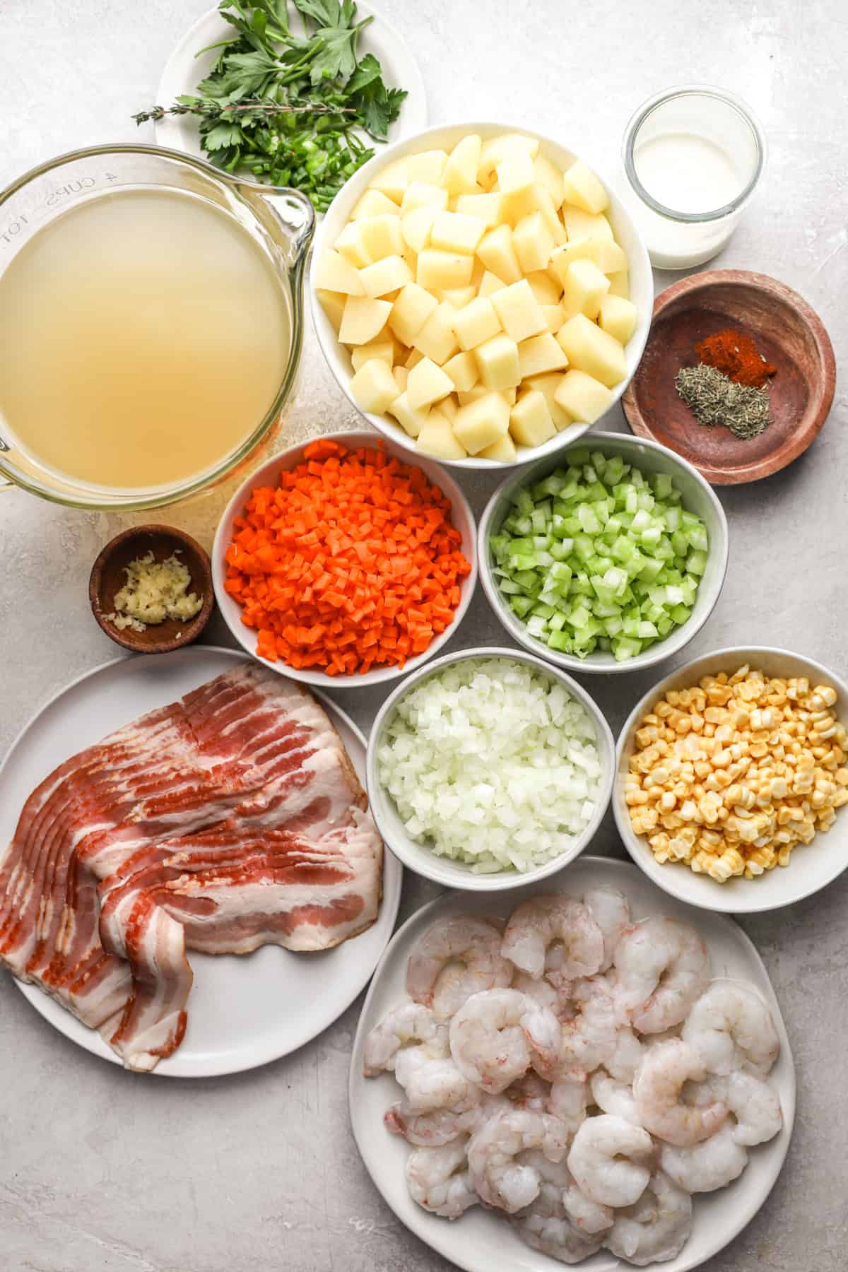 Ingredients for creamy bacon, potato, shrimp, and corn chowder. 