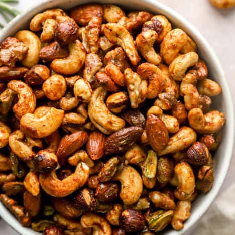 Overhead image of a bowl of party nuts.