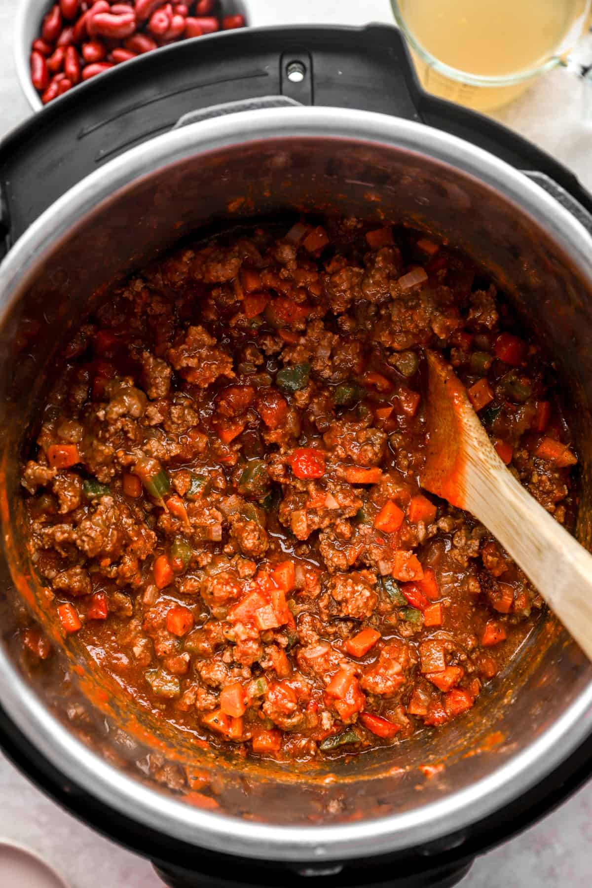 Classic beef chili cooking in an Instant Pot.