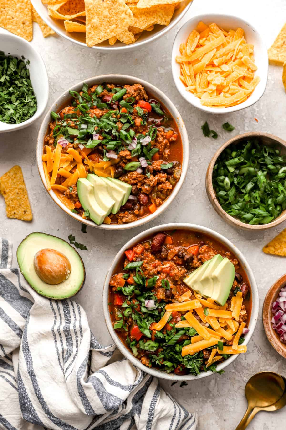 Overhead image of two bowls of Instant Pot beef chili.