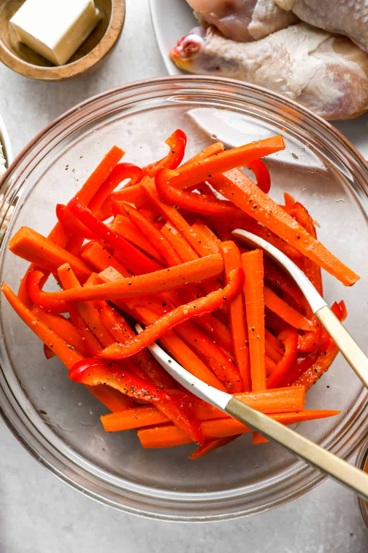 Veggies being seasoned.