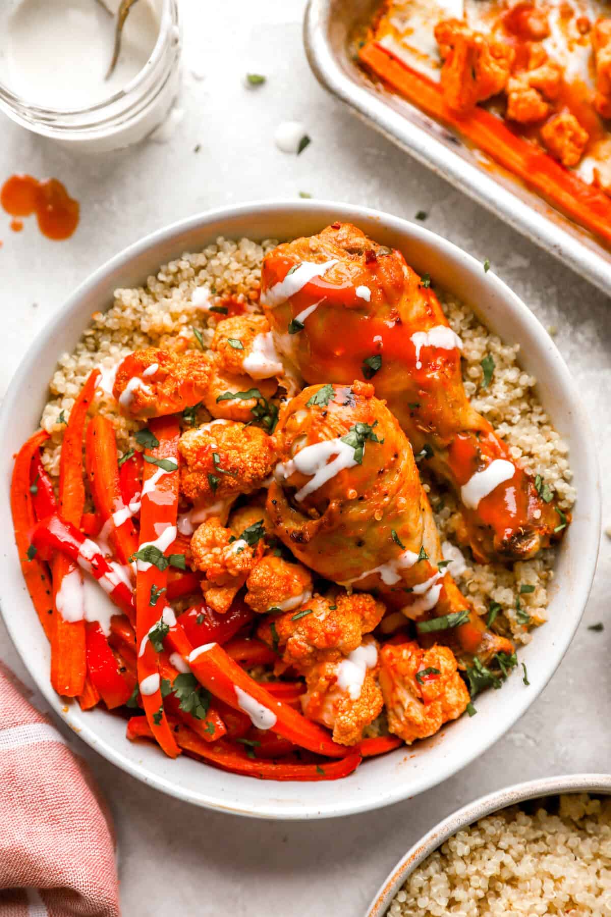 Sheet Pan Buffalo Chicken and Veggies on a plate.