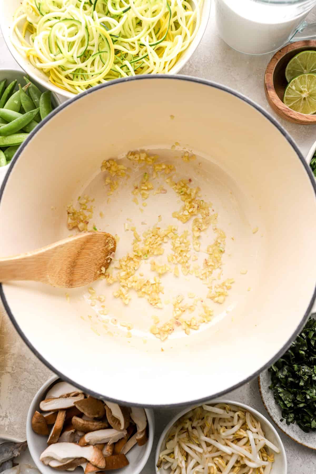 Garlic sautéing in a pot. 