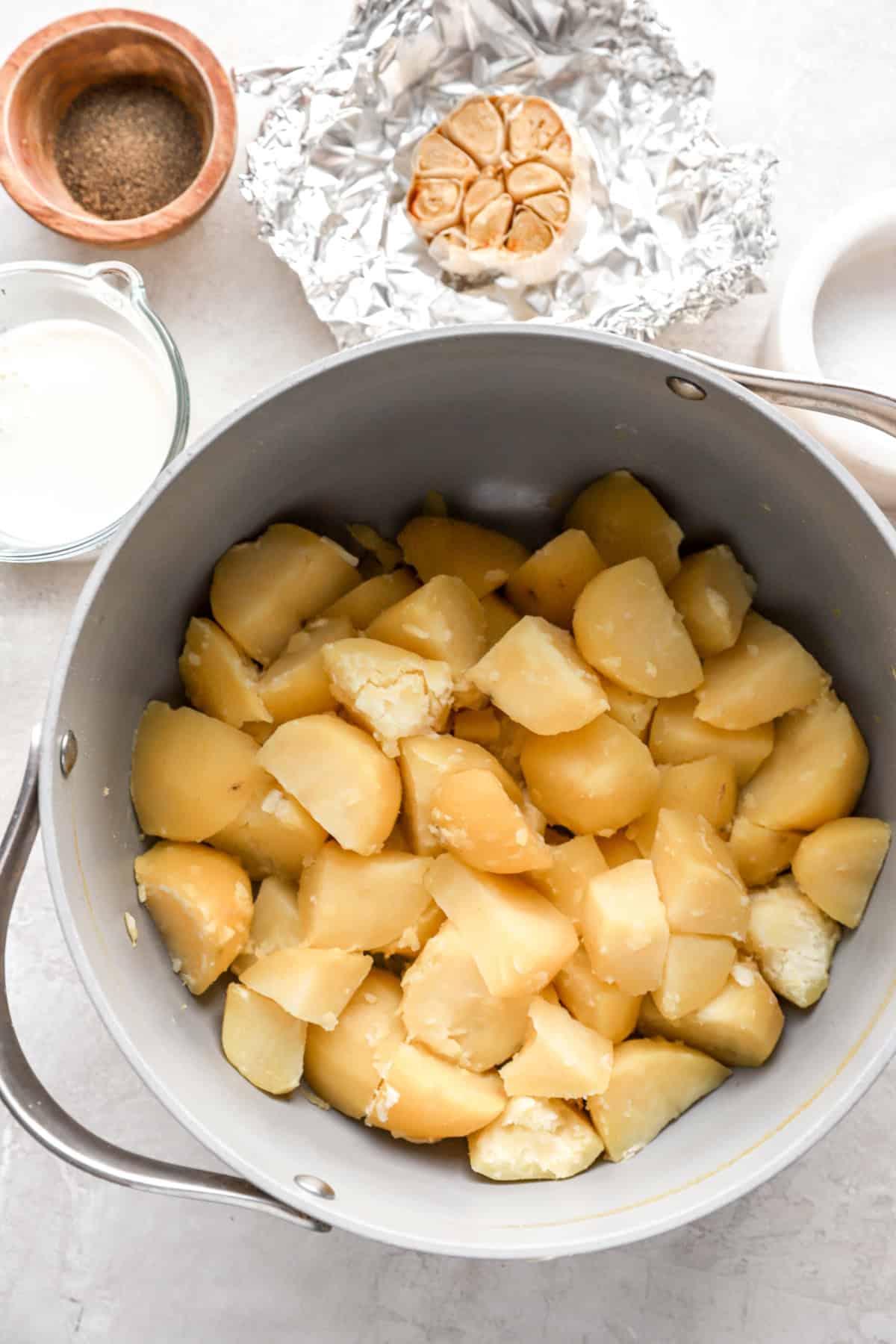 Potato cubes in a pot. 