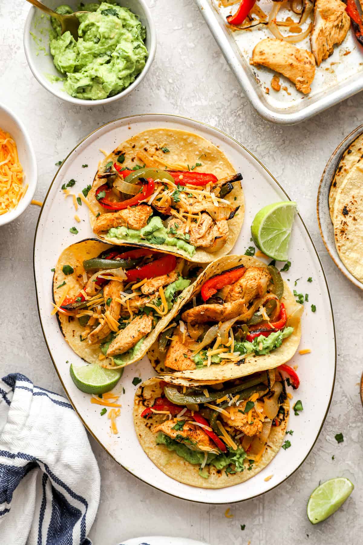 A platter of chicken fajita tacos. 