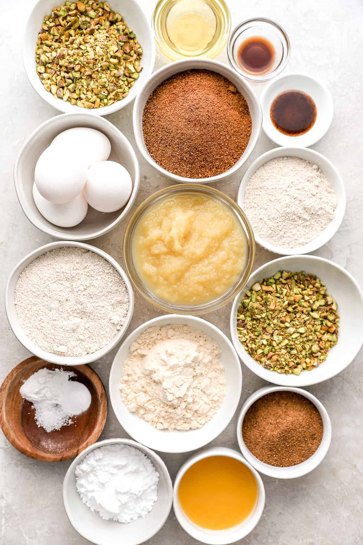 Ingredients to make a pistachio cake with streusel topping. 