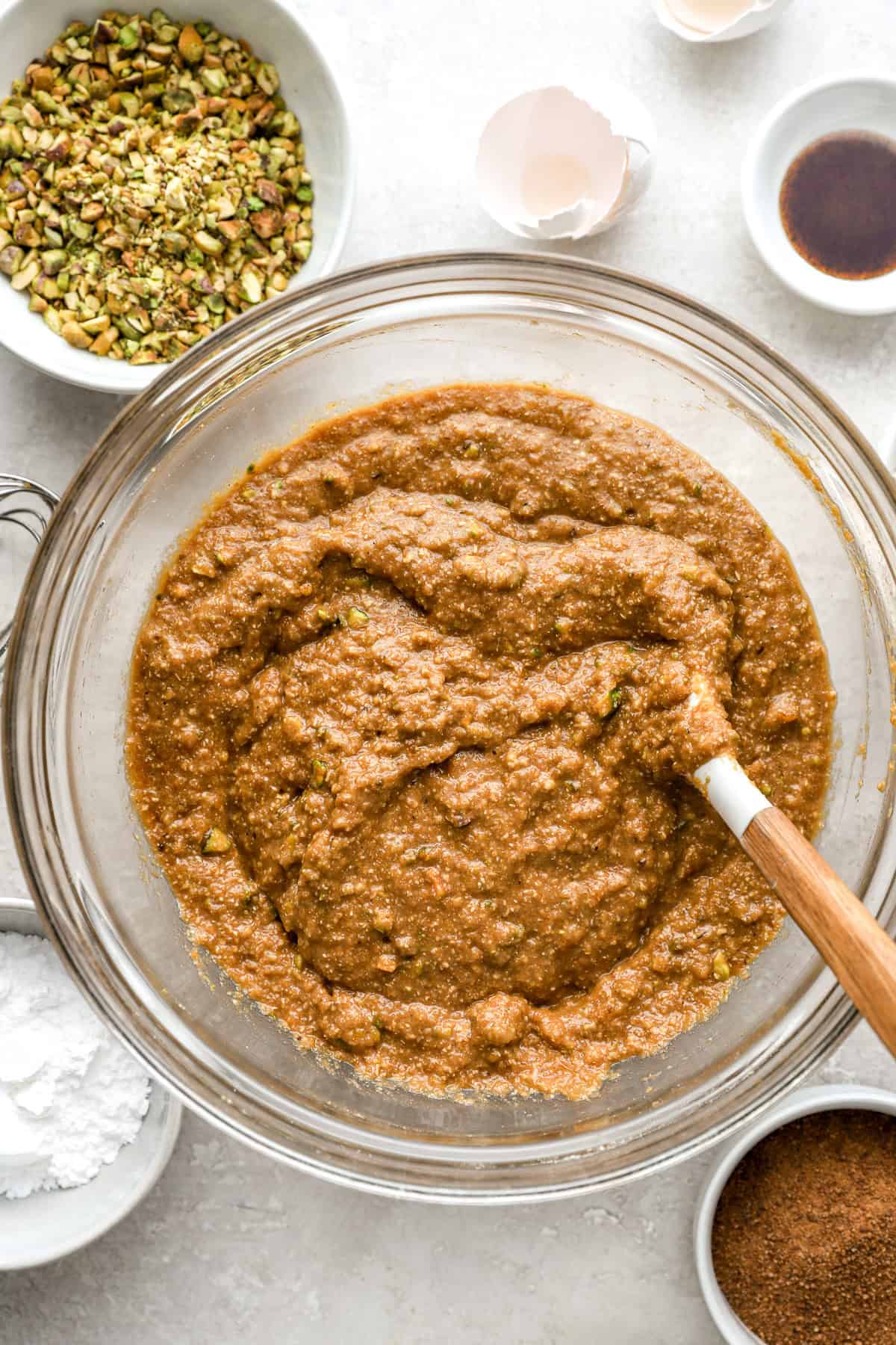 Pistachio snack cake batter in a bowl. 