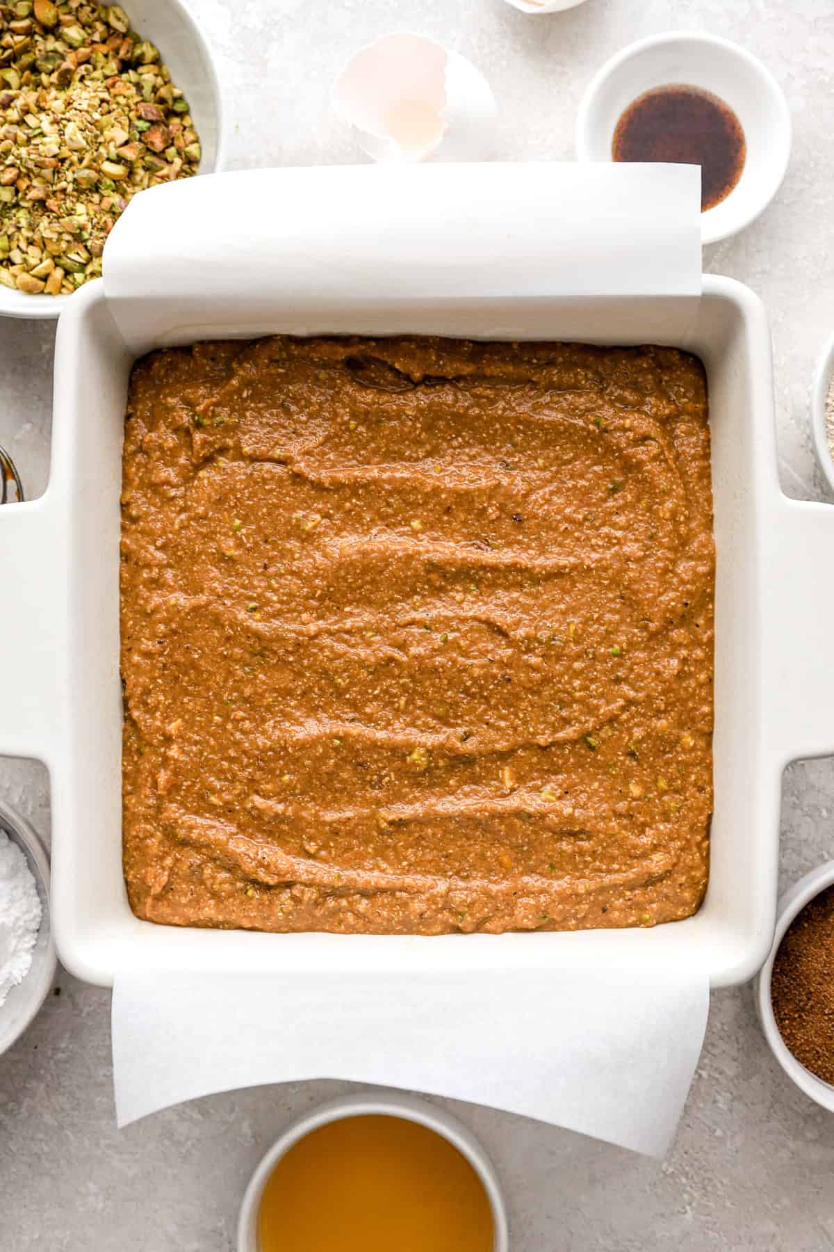 Pistachio cake in a square pan. 